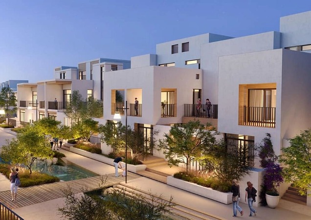 Modern luxury townhouse community in Dubai featuring elegant homes, green spaces and family-friendly amenities