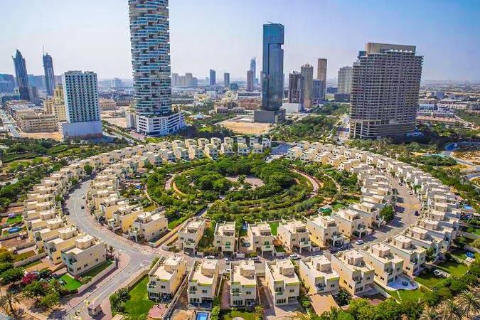 Contemporary residential buildings and lifestyle amenities within Jumeirah Village Circle Dubai